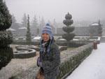 Sonya infront of snow covered topiary