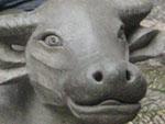 Myself sitting on an ox statue, not part of Shen House