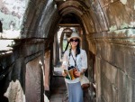 Sonya reading the guide book at Phimeanakas Temple