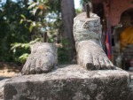 The feet of a statue at Preah Palilay Temple