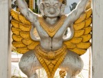 Garuda carved into the fence of Wat Kamphaeng
