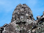One of the multitude of serene and massive stone faces at Bayon
