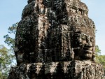 One of the many pillars of heads at Bayon Temple