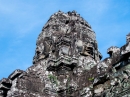 One of the multitude of serene and massive stone faces at Bayon