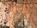 Buddhist figure in carved wall