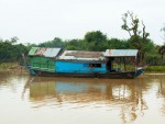 Boat on one of the tributaries feeding into Tonle Sap Lake