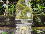 monkey-forest-ubud-bali-indonesia-c-monkey-at-the-base-of-a-monkey-statue