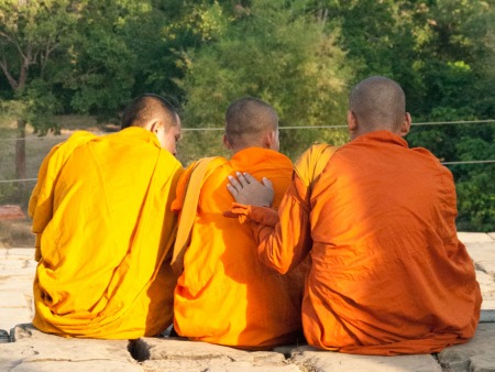 Monks sitting at Phnom Bakheng