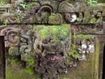 ubud-city-bali-indonesia-ubud-palace-h-green-moss-growing-on-a-stone-carving