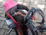 ubud-city-bali-indonesia-ubud-palace-l-farah-taking-a-break-and-sleeping-in-the-backpack