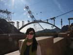 Sonya at Hoover Dam with bypass construction in the background