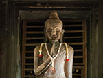 Standing Buddha status inside the main inner spire