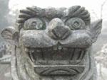 A stone dragon at the entrance of the pagoda