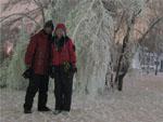 Us surrounded by snow covered trees