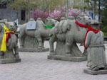 Statues of travellers along the Silk Road