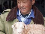A man and his baby yak