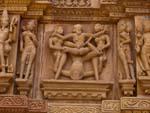 One of the most famous erotic carvings found on the Kandariya Mahadev Temple