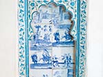 Scenes of westerners in a pastel blue decorative frame