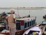 A local man looking over the boats towards the Ganges
