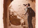 Travis taking a photo of one of the many mud brick alleys