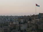 Amman Day One - Amman at dawn with the Jordan flag