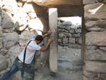 Qasr Azraq Castle - Travis closing the stone door