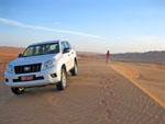 Sonya and the four wheel drive at Wahiba Sands