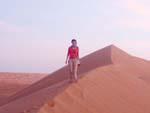 Sonya on the tip of a sand dune