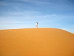 Sonya on the tip of a sand dune