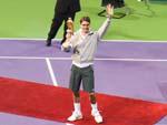 Roger Federer presented with winners trophy