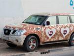 Decorated car in white and maroon colours