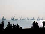 Dhows sailing across the Arabian gulf