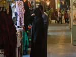 People browsing cloths at Souk Waqif