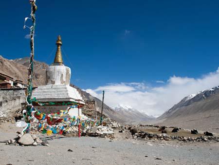 Chorten outside Rongphu the highest monastery in the world, in the background is a cloud covered Everest