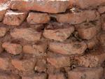 Original red brick walls of Troy II and III